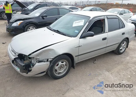 1999 Toyota Corolla Ce z USA, uszkodzony, nr VIN 1NXBR12E1XZ294763